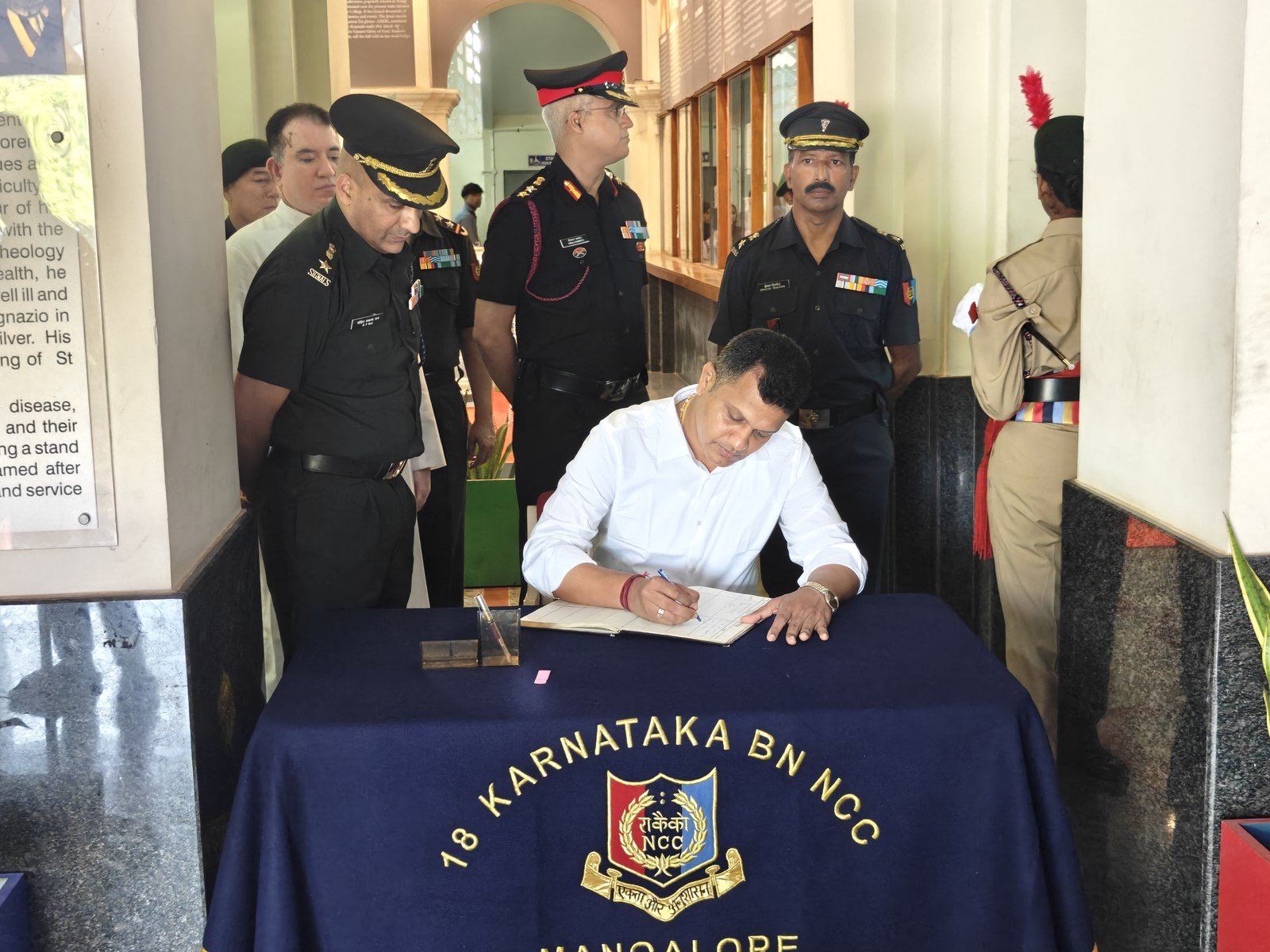 Captain Brijesh Chowta at an NCC memorandum signing with students and cadets