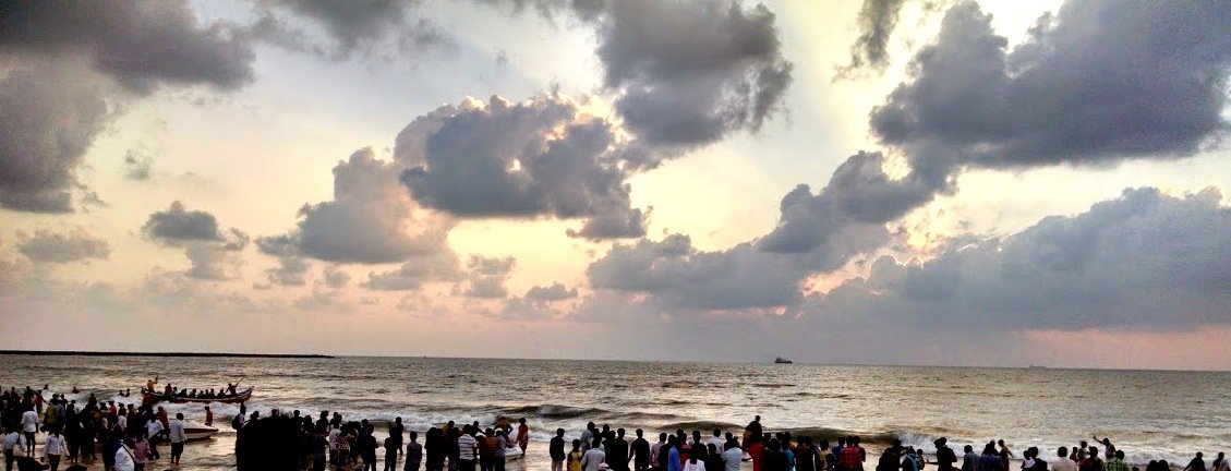 Golden-hour crowds on Panambur beach, Mangaluru - the Dakshina Kannada coast